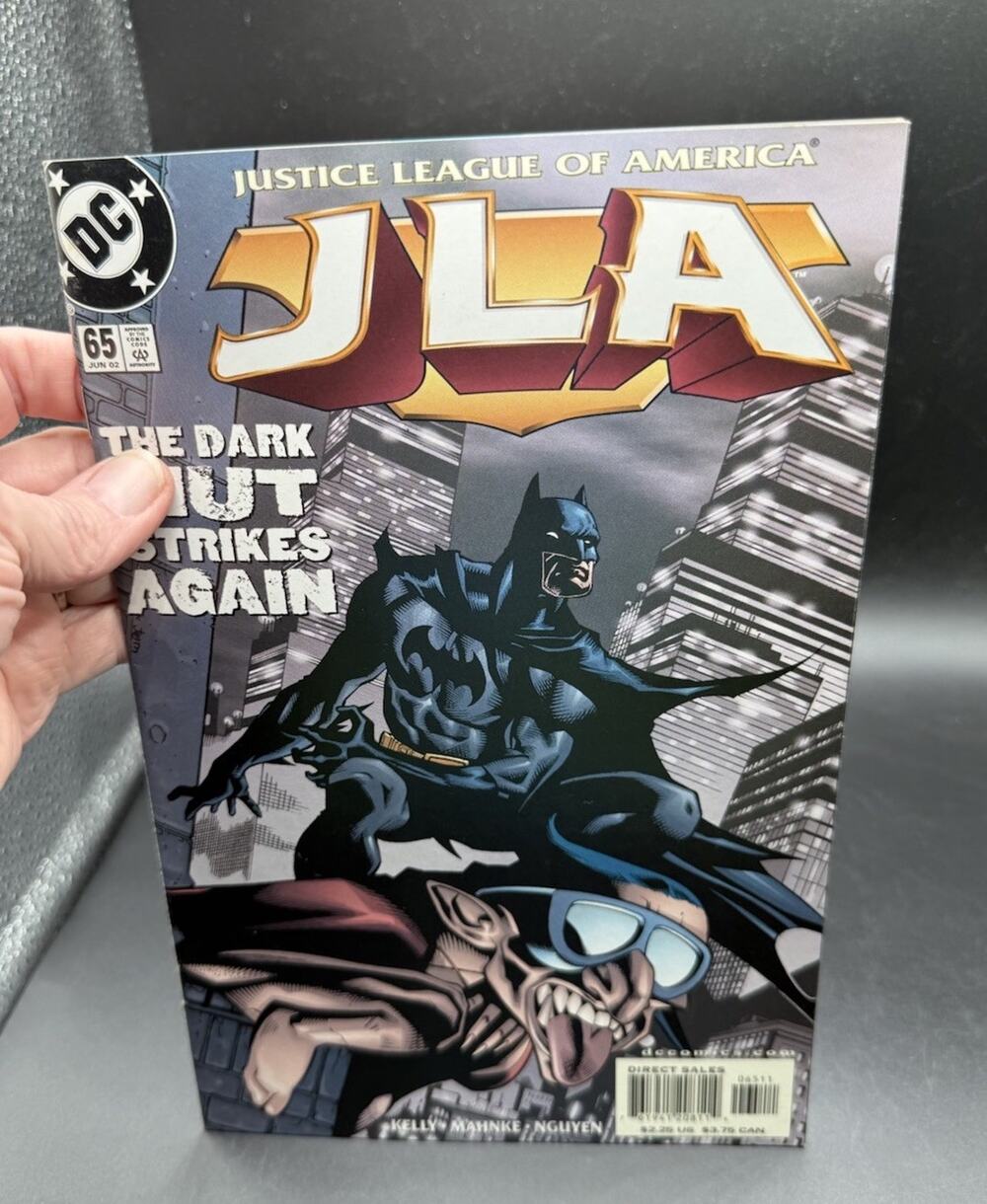 JLA 65 Dark Nut Strikes Justice League America Batman Superman Mint! -C
